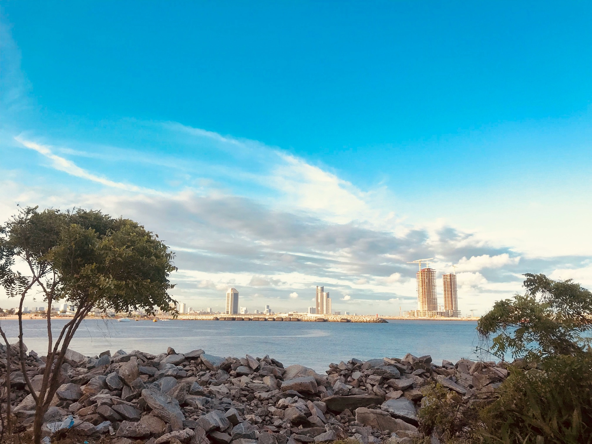 Lagos waterfront skyline with blue waters and modern buildings